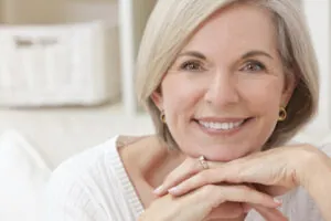 woman smiling after restorative care from Ridgeview Dental
