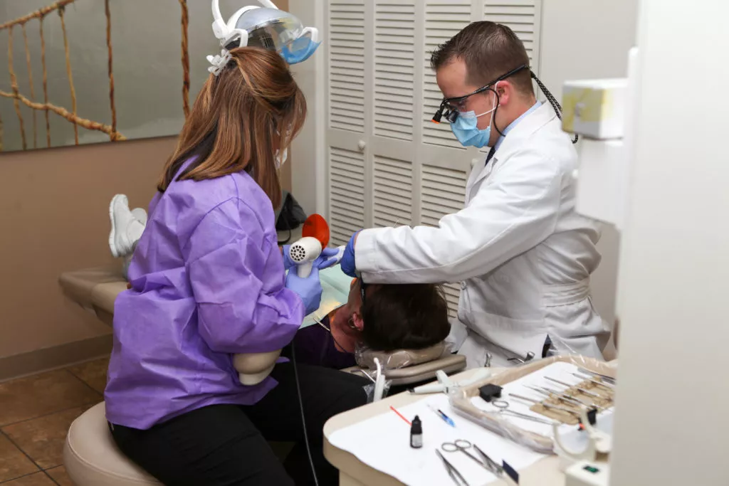 Patient getting work from the extensive menu of dental services at Ridgeview Dental in Centennial CO.